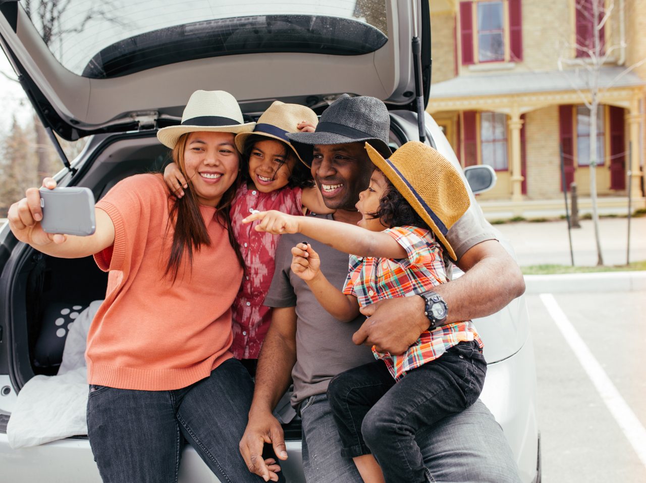 Woman looking out window of car